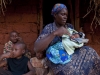 Mama Muema with her children and newborn